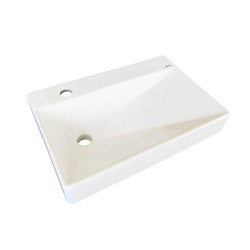 Lavabo cuadrado con monomando y accesorios.